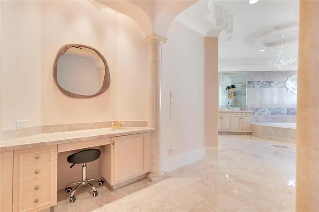 a bathroom with a granite countertop sink a toilet and shower