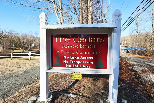 a sign on the side of a road
