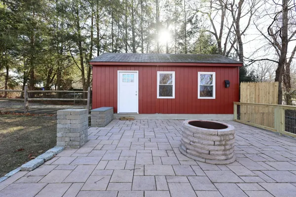 a house view with a backyard space