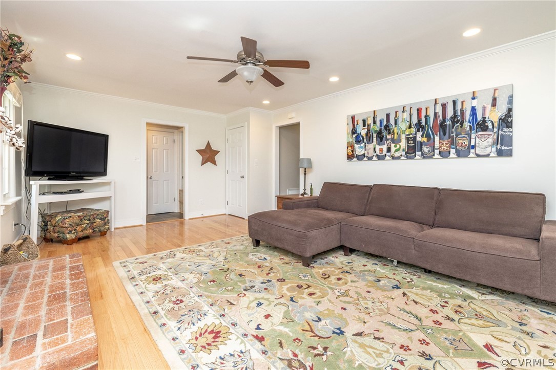 13331 Queensgate Road Midlothian, VA 23114 - Photo 12 of 46 a living room with furniture and a flat screen tv