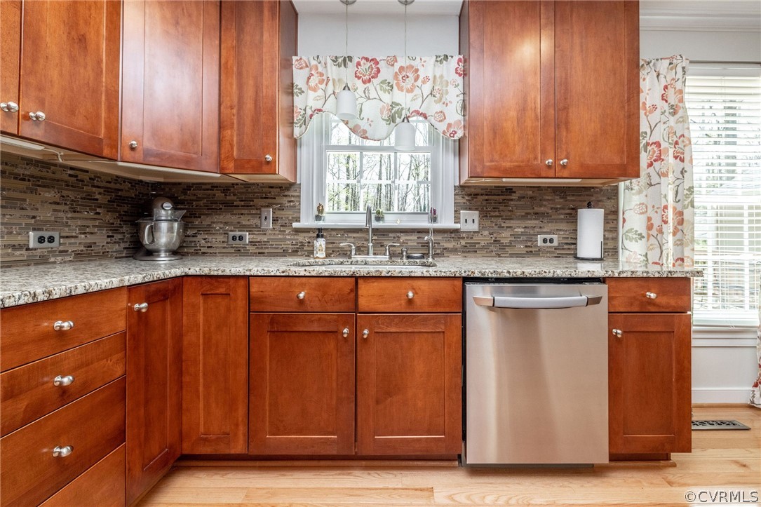 13331 Queensgate Road Midlothian, VA 23114 - Photo 17 of 46 a kitchen with stainless steel appliances granite countertop wooden cabinets a sink and dishwasher with wooden floor