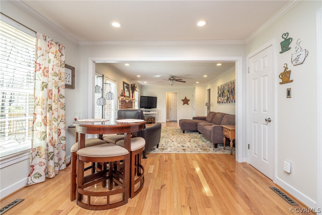 13331 Queensgate Road Midlothian, VA 23114 - Photo 20 of 46 a living room with furniture and a wooden floor