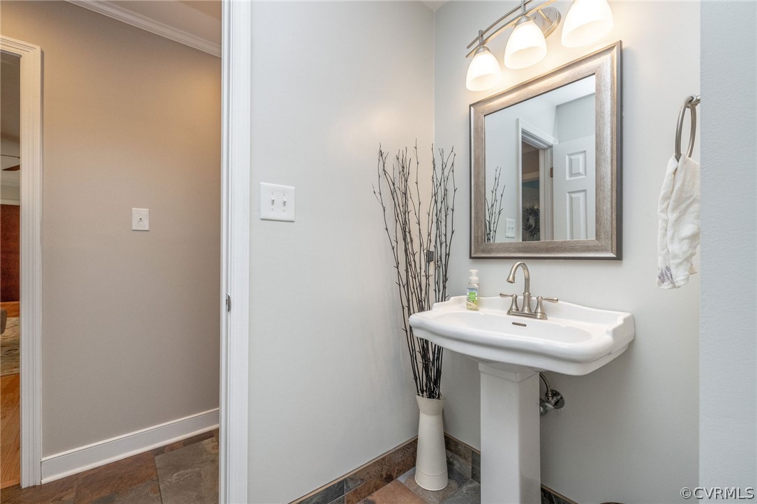 13331 Queensgate Road Midlothian, VA 23114 - Photo 22 of 46 a bathroom with a sink and a mirror