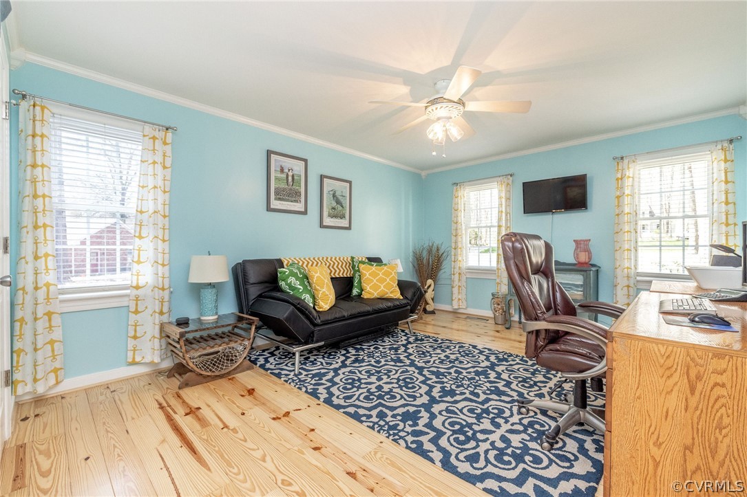 13331 Queensgate Road Midlothian, VA 23114 - Photo 24 of 46 a living room with furniture a flat screen tv and a window