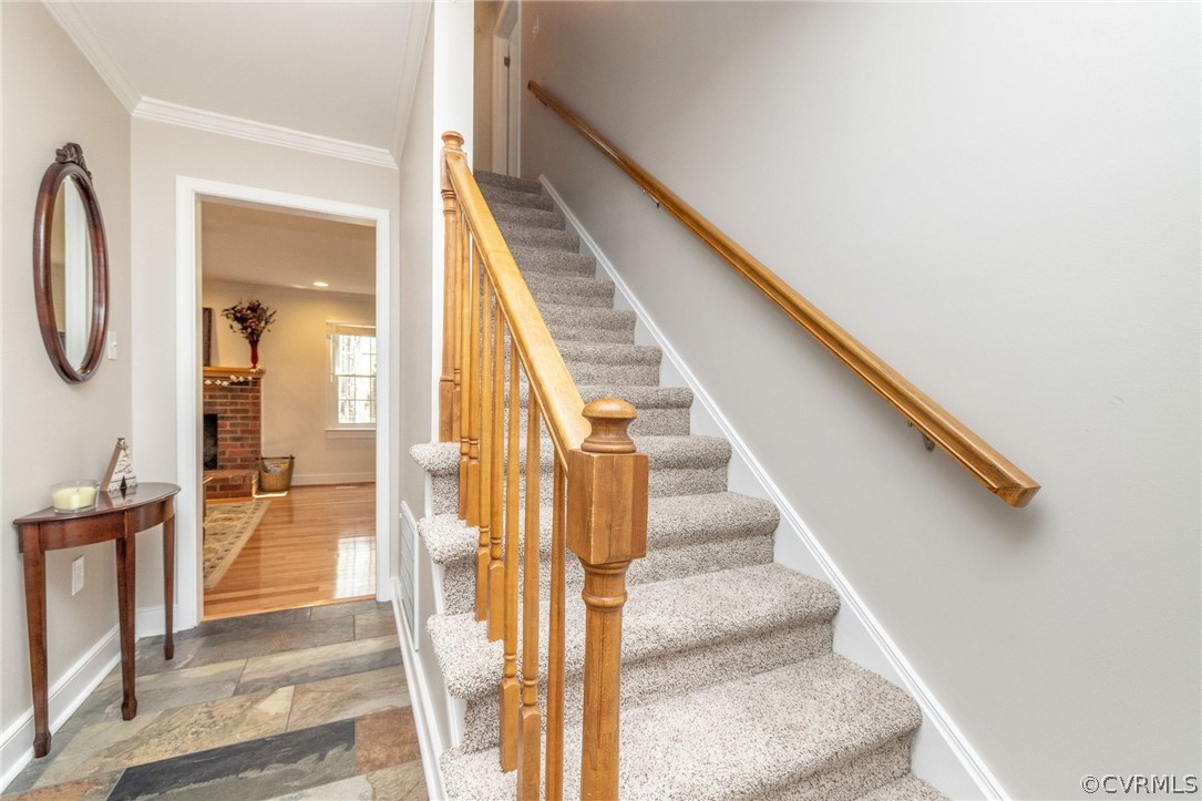 13331 Queensgate Road Midlothian, VA 23114 - Photo 27 of 46 a view of an entryway with wooden floor and door