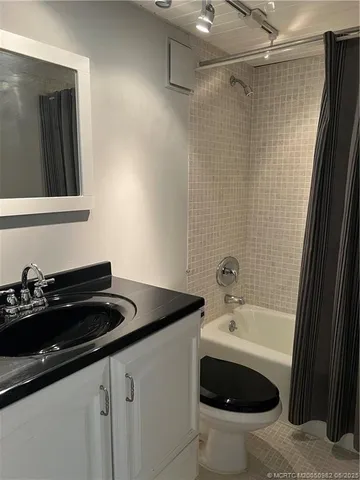 a bathroom with a sink and a bathtub
