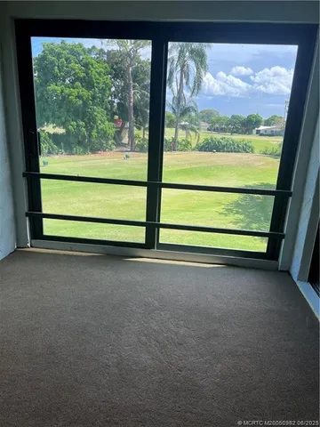 a view of outdoor space with a large window