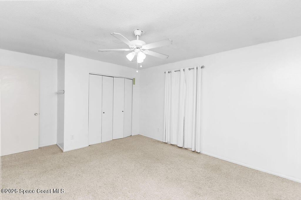 4304 London Town Road, Unit D224 Titusville, FL 32796 - Photo 14 of 23 Primary Bedroom
