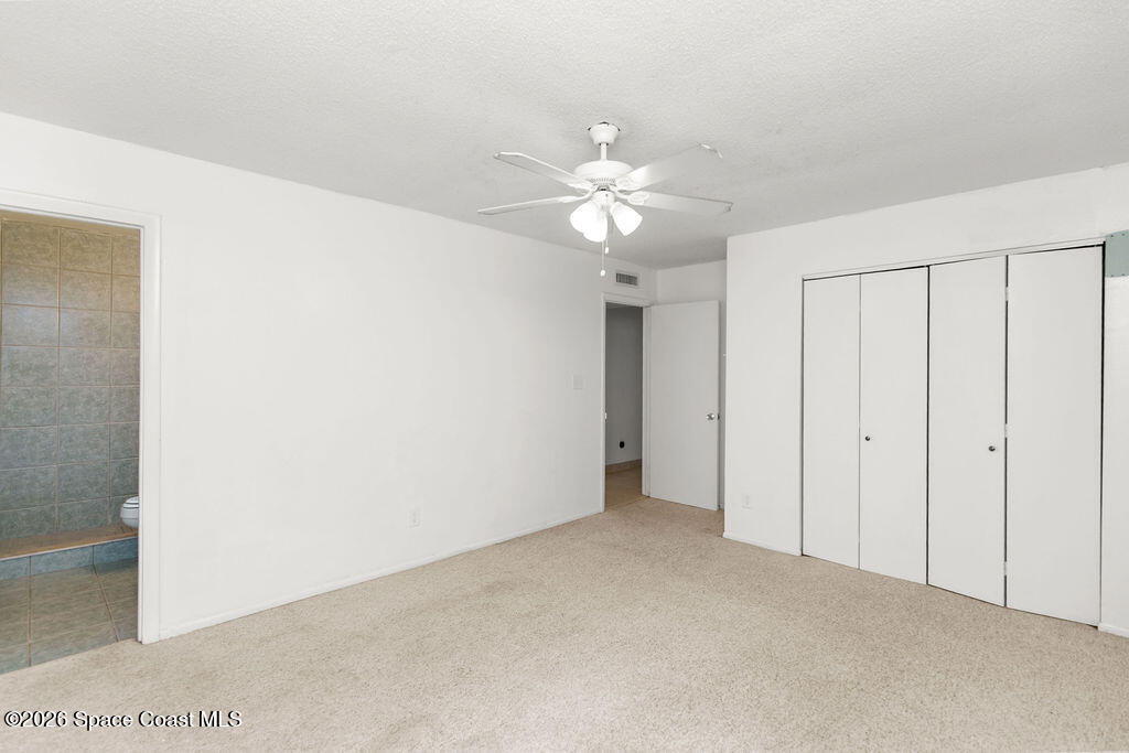 4304 London Town Road, Unit D224 Titusville, FL 32796 - Photo 15 of 23 Primary Bedroom