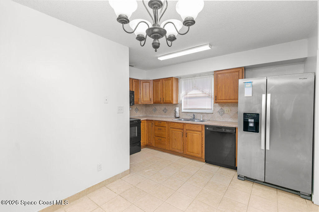 4304 London Town Road, Unit D224 Titusville, FL 32796 - Photo 10 of 23 Dining Room to Kitchen