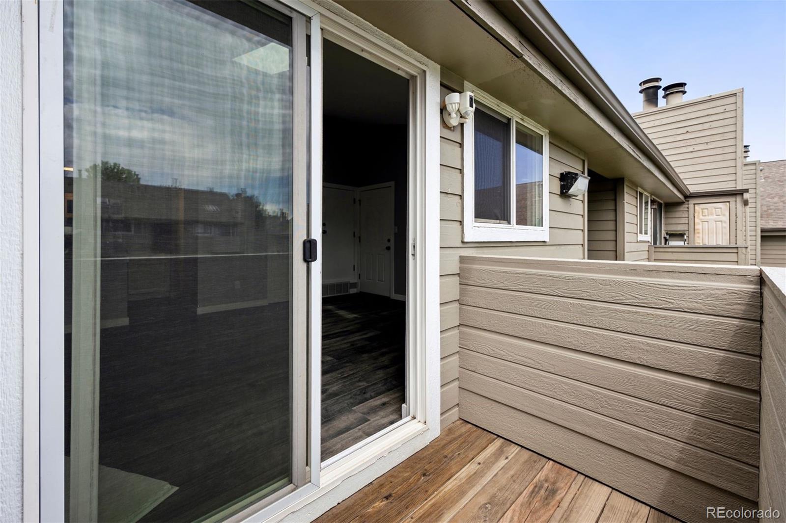 3100 South Federal Boulevard, Unit 331 Denver, CO 80236 - Photo 11 of 29 a view of a balcony and a door