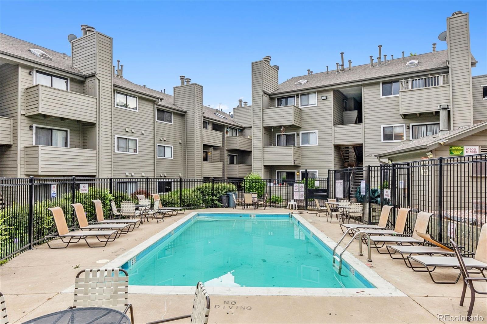 3100 South Federal Boulevard, Unit 331 Denver, CO 80236 - Photo 14 of 29 a building view with outdoor seating space