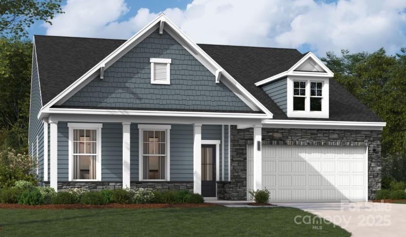 5119 Raging Crk Drive Indian Trail, NC 28079 - Photo 1 of 34 a front view of a house with garden