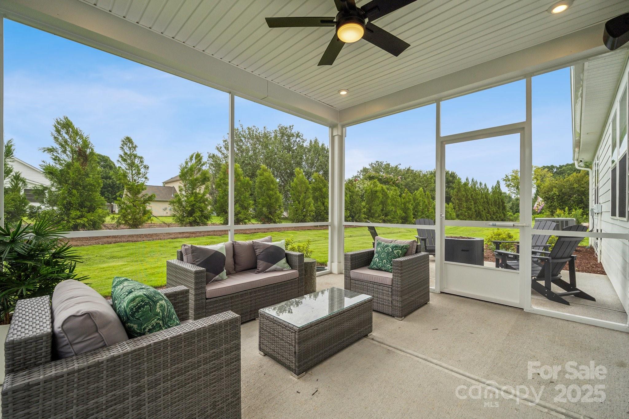 5119 Raging Crk Drive Indian Trail, NC 28079 - Photo 2 of 34 a view of a patio with couches and pool