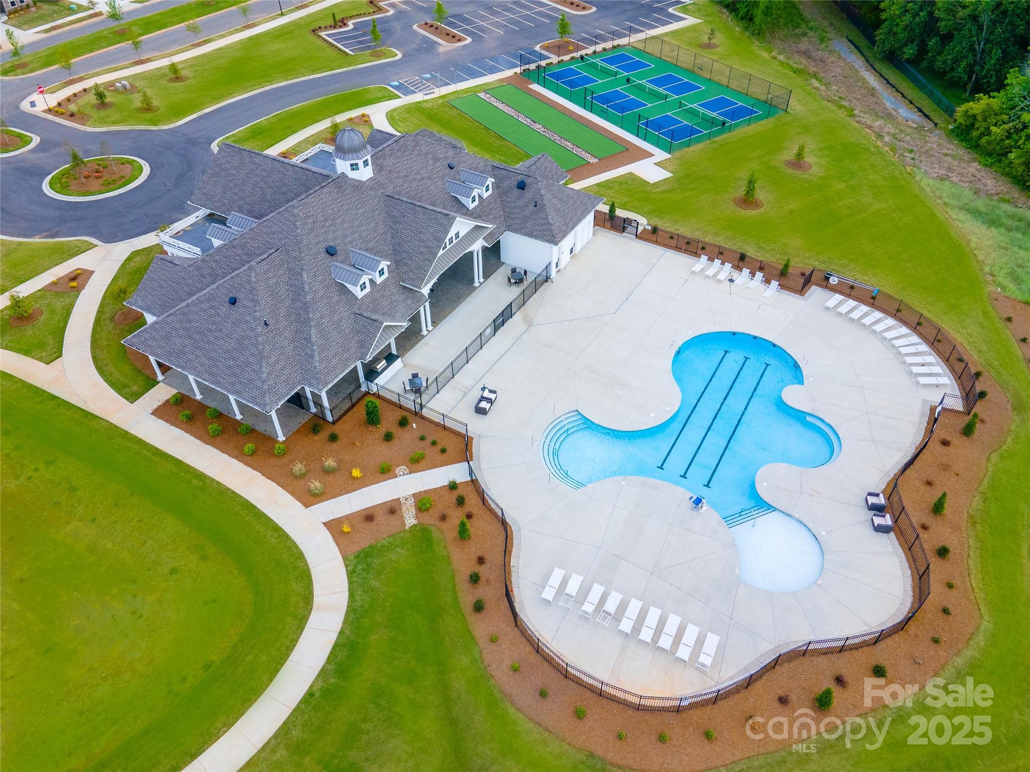 5119 Raging Crk Drive Indian Trail, NC 28079 - Photo 24 of 34 an aerial view of a house with a swimming pool