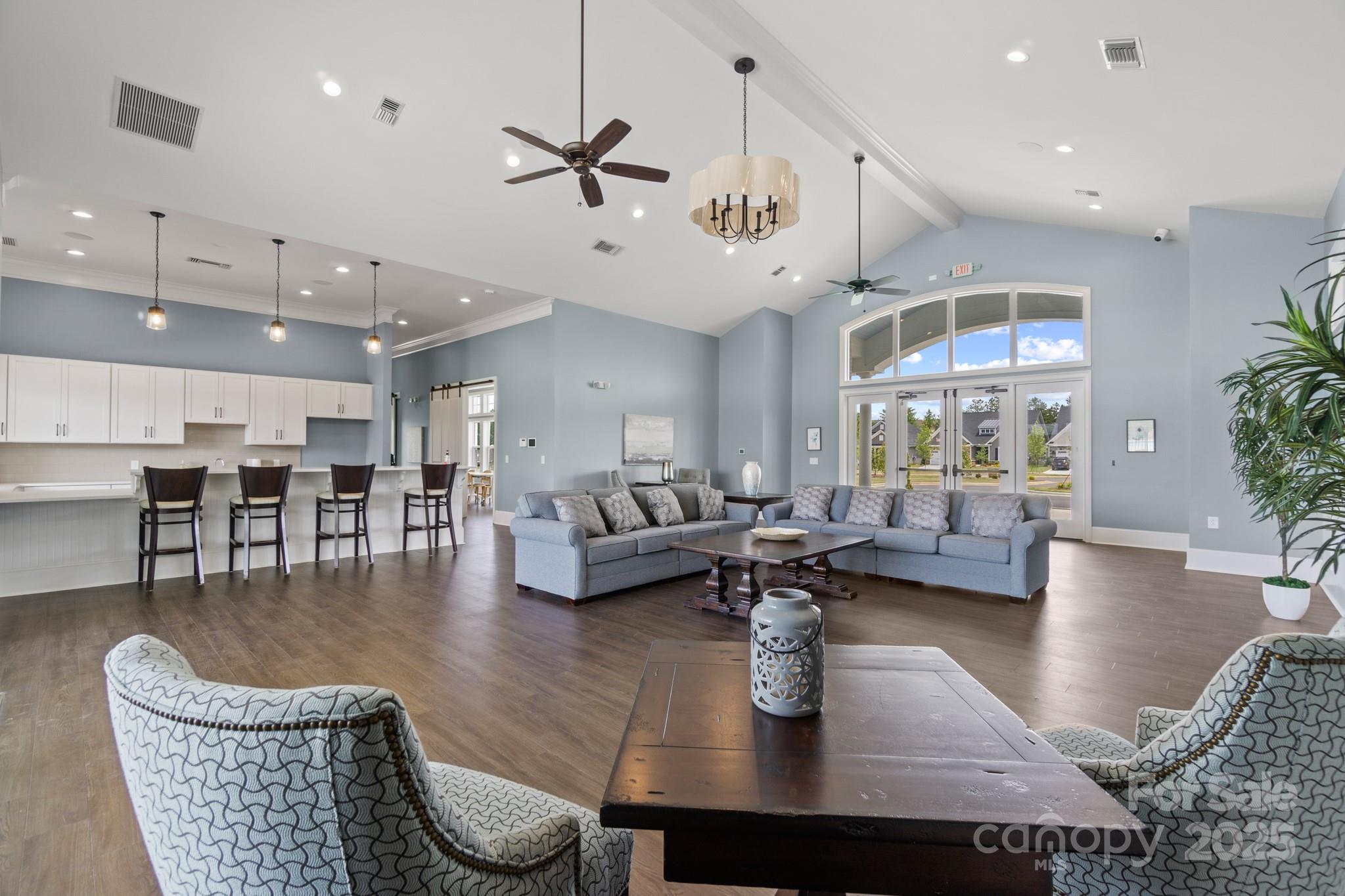 5119 Raging Crk Drive Indian Trail, NC 28079 - Photo 27 of 34 a living room with furniture kitchen view and a large window