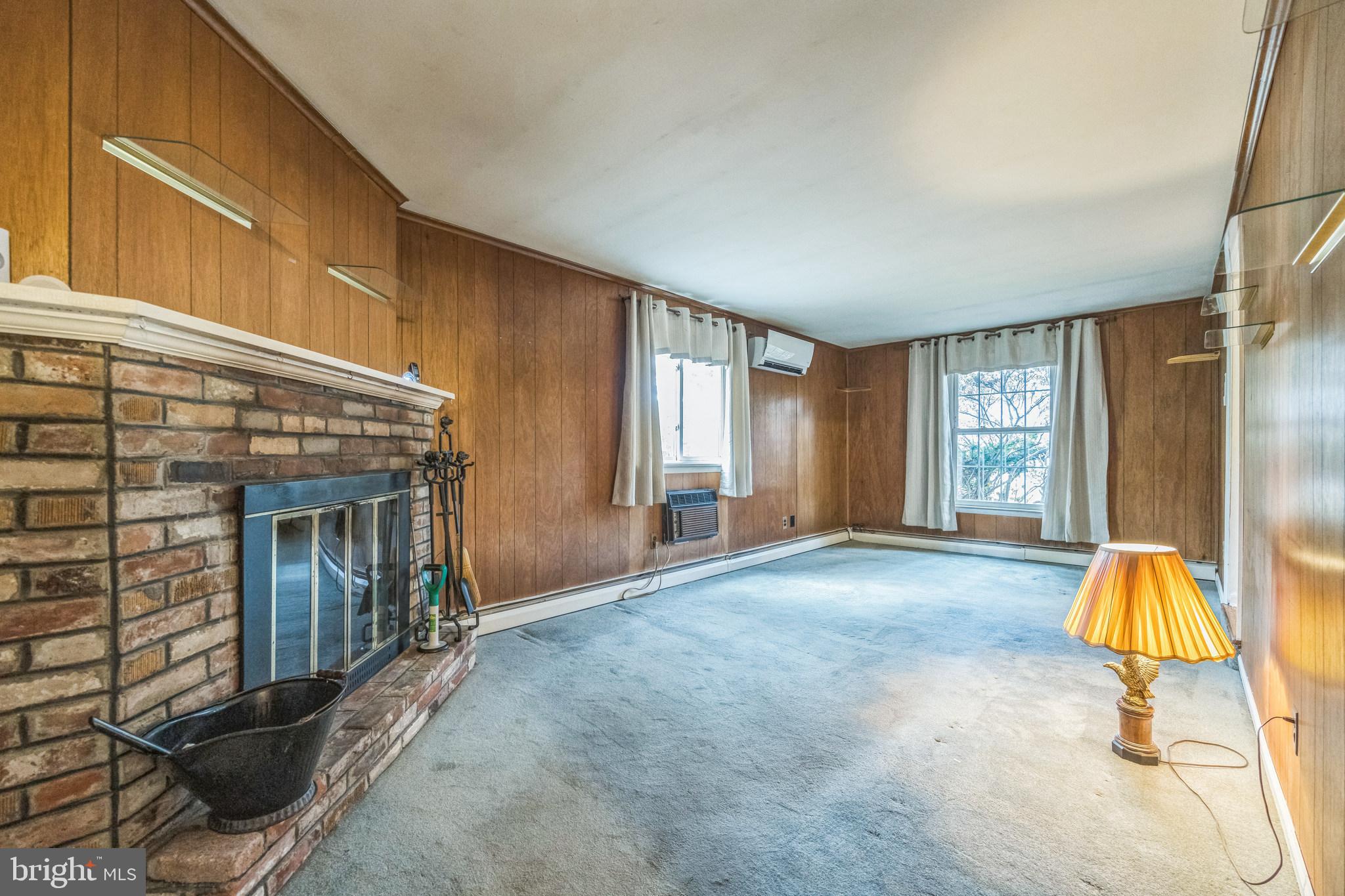8 Lawrence Road Audubon, PA 19403 - Photo 34 of 36 Den w/wood FP