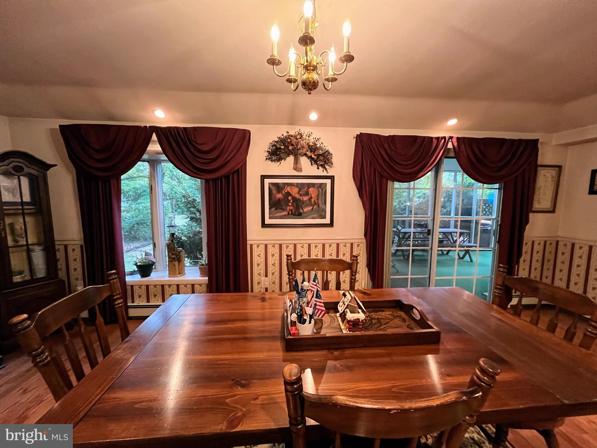 8 Lawrence Road Audubon, PA 19403 - Photo 7 of 36 Dining room overlooks the sunroom and yard