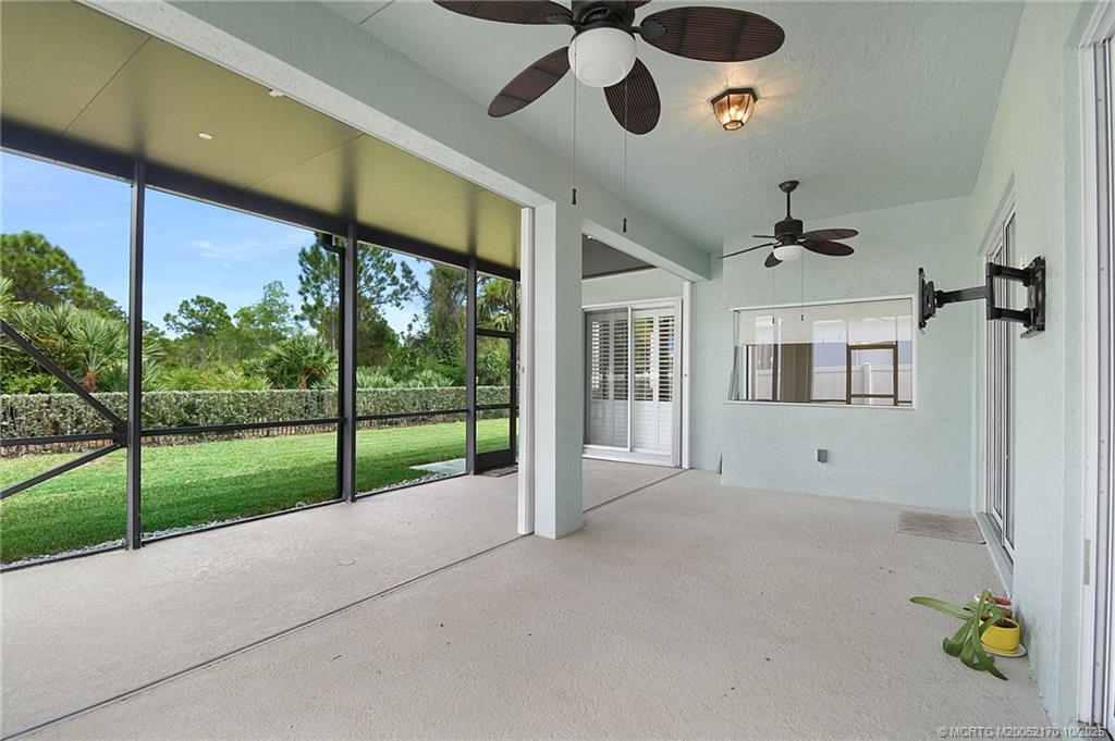 439 Northwest Sunflower Place Stuart, FL 34994 - Photo 29 of 68 a view of a house with porch and garden