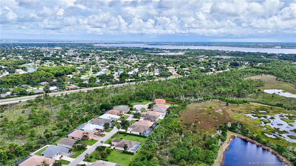 439 Northwest Sunflower Place Stuart, FL 34994 - Photo 49 of 68 a view of a city with lots of trees