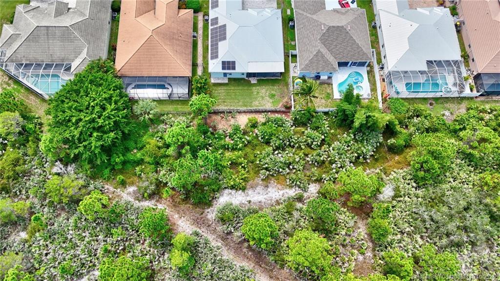 439 Northwest Sunflower Place Stuart, FL 34994 - Photo 66 of 68 an aerial view of multiple house