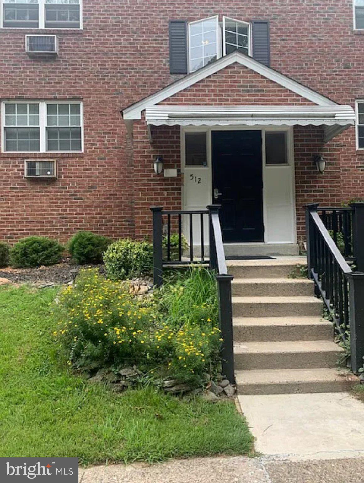 512 Stidman Drive, Unit D3 Springfield, PA 19064 - Photo 2 of 18 Charming entrance with lush greenery.