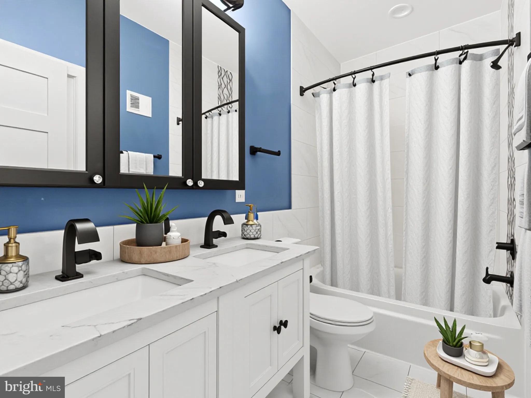 1267 Penn Street Northeast, Unit B Washington, DC 20002 - Photo 13 of 20 a bathroom with a sink a toilet and a mirror