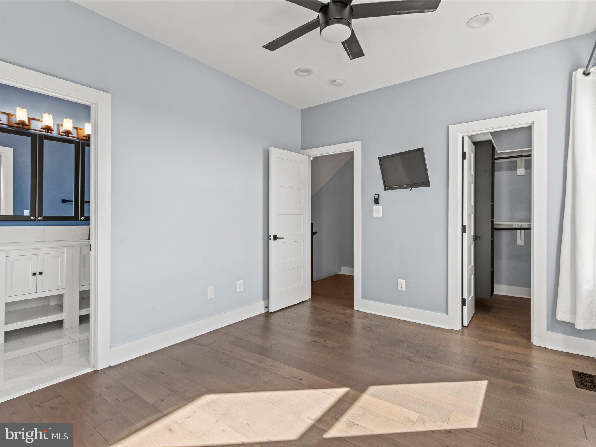 1267 Penn Street Northeast, Unit B Washington, DC 20002 - Photo 10 of 20 a view of a hallway with entryway wooden floor and front door