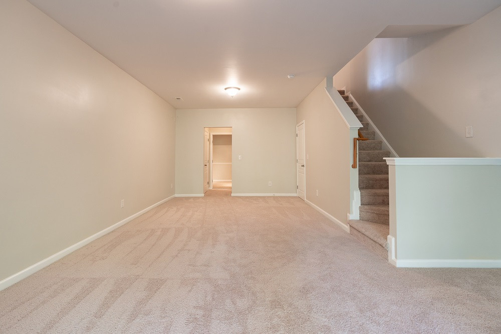 7828 Spungold Street Raleigh, NC 27617 - Photo 13 of 30 Lower Level Family Room