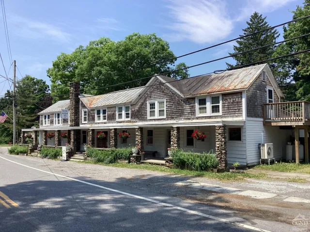 a front view of a building with street view