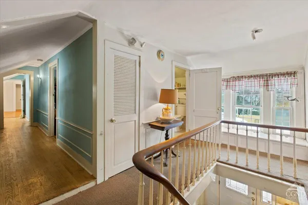 a view of an entryway with a floor to ceiling window