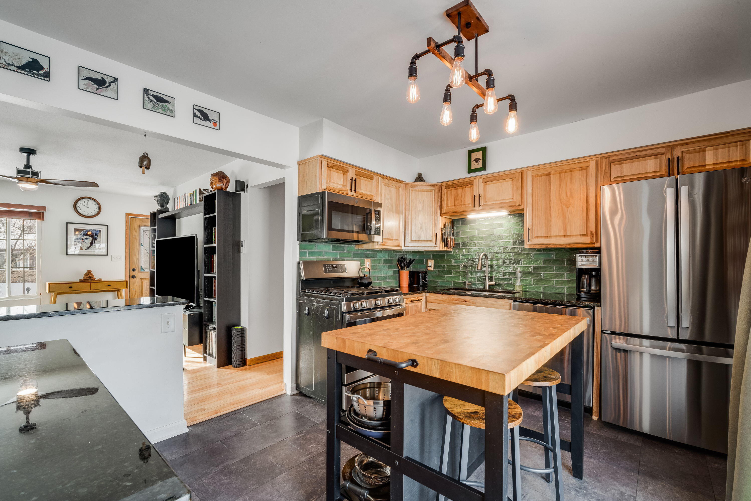 732 Chicory Road Burlington, WI 53105 - Photo 9 of 27 New Flooring, Hickory Cabinets, Granite Countertops, Tile Backsplash, New SS Appliances, Garbage Disposal, RO Water System!