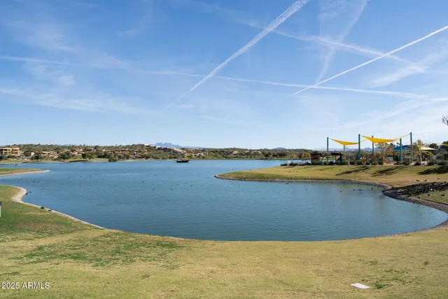 a bathroom with a sink a mirror and a toilet