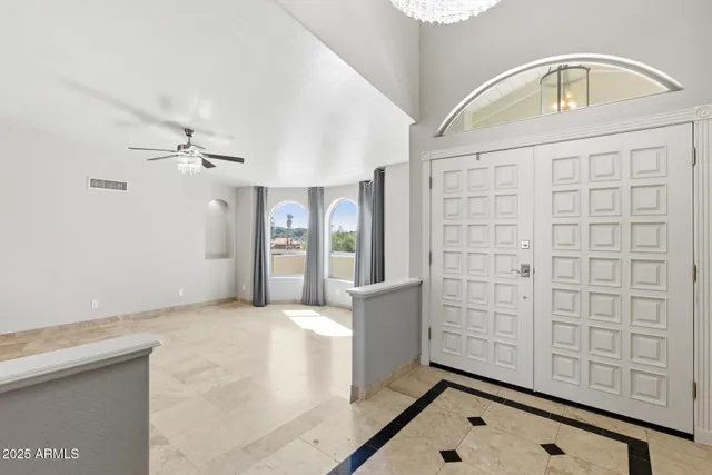 a bathroom with a tub a sink a vanity and a shower
