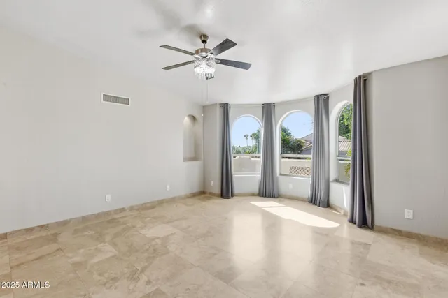 a bathroom with a granite countertop sink mirror and double