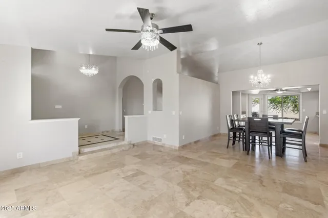 a bathroom with a tub and shower