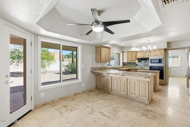 a view of a dining room with furniture