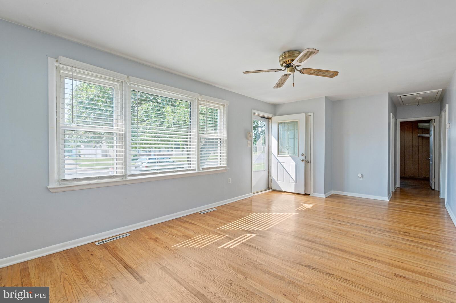 212 North Brownleaf Road Newark, DE 19713 - Photo 5 of 10 a view of empty room with wooden floor and fan