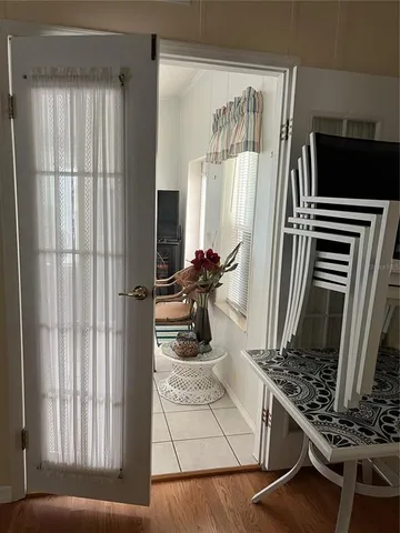 a view of house with outdoor space and garden