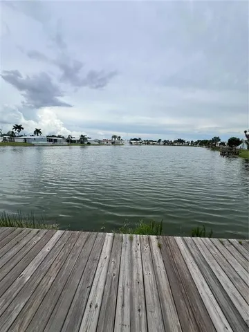 a view of house with yard