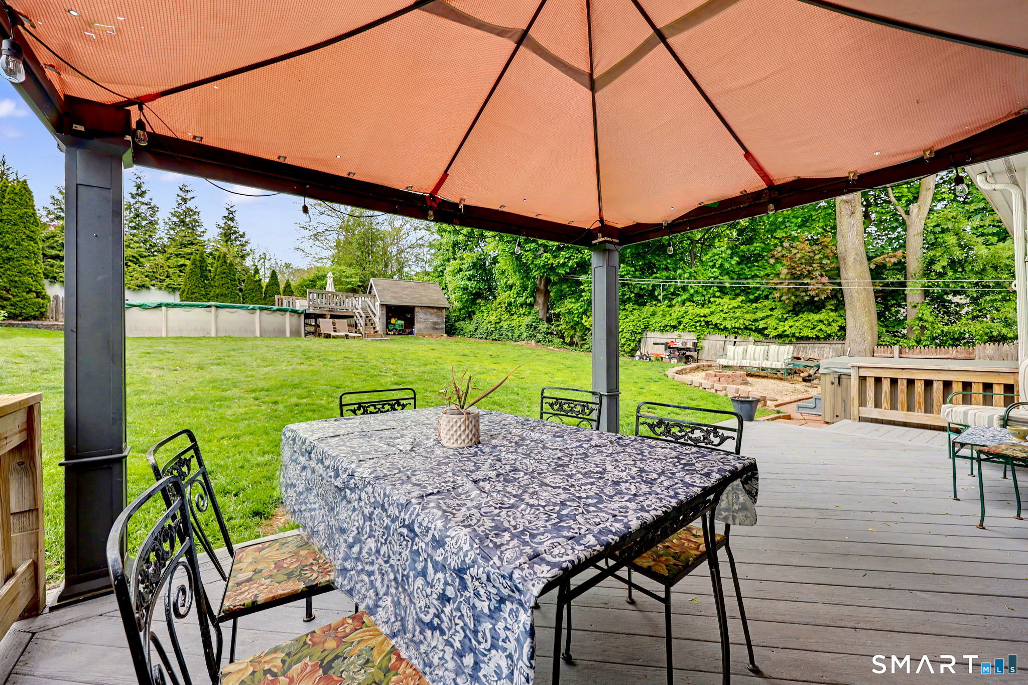 7 Merrill Road Trumbull, CT 06611 - Photo 39 of 40 a view of a patio with a table chairs and a backyard