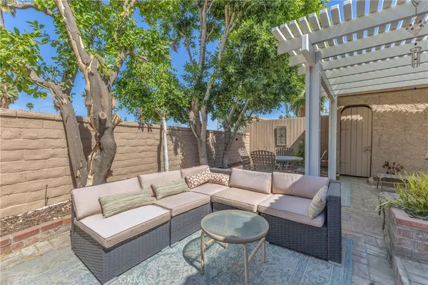 a view of a swimming pool with a patio