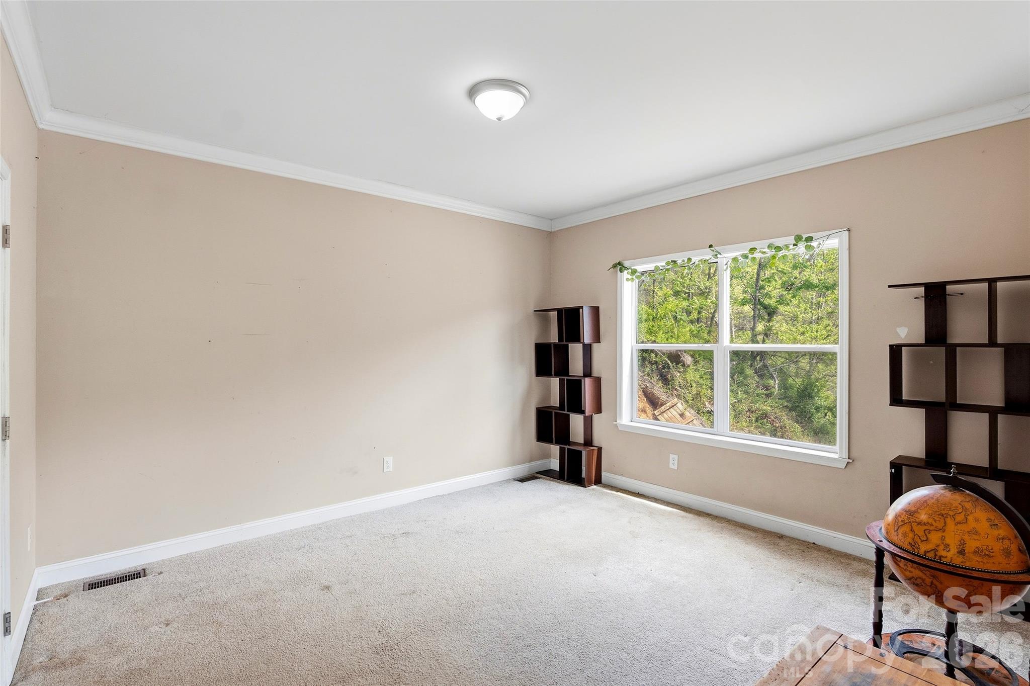 26 Brigman Road Weaverville, NC 28787 - Photo 12 of 27 a view of room with window and furniture