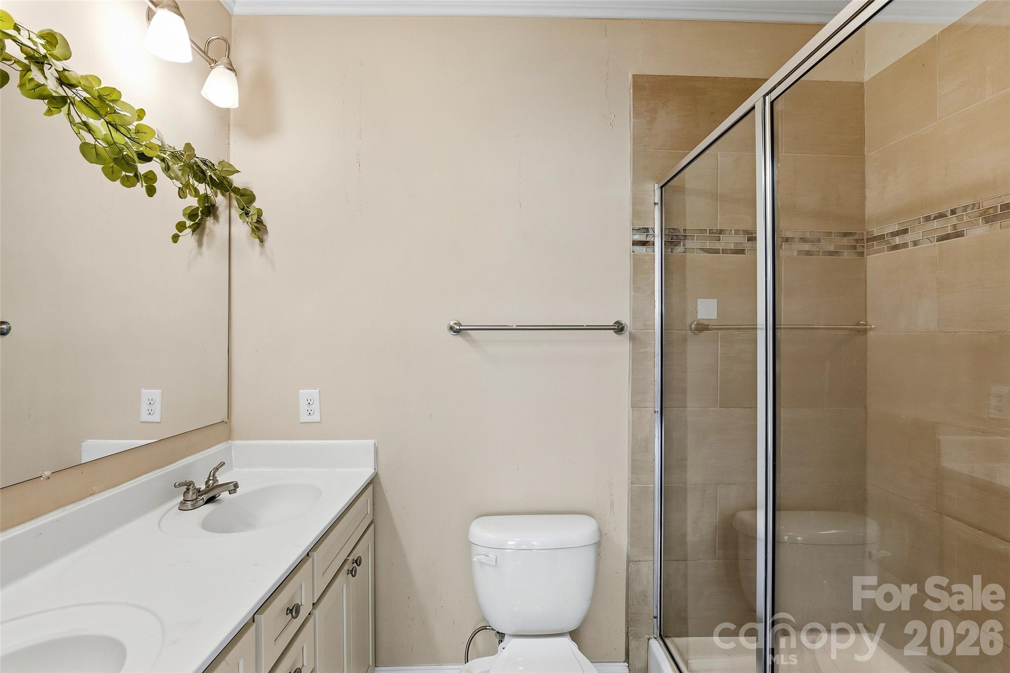 26 Brigman Road Weaverville, NC 28787 - Photo 13 of 27 a bathroom with a sink toilet and shower