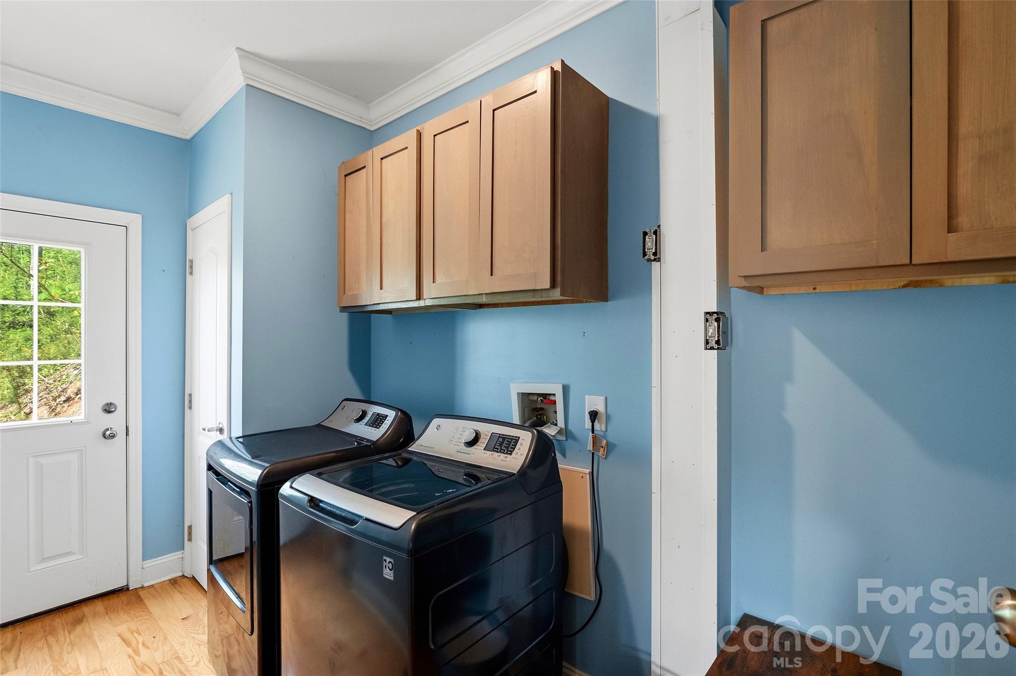 26 Brigman Road Weaverville, NC 28787 - Photo 15 of 27 a kitchen with granite countertop a stove and a wooden cabinets