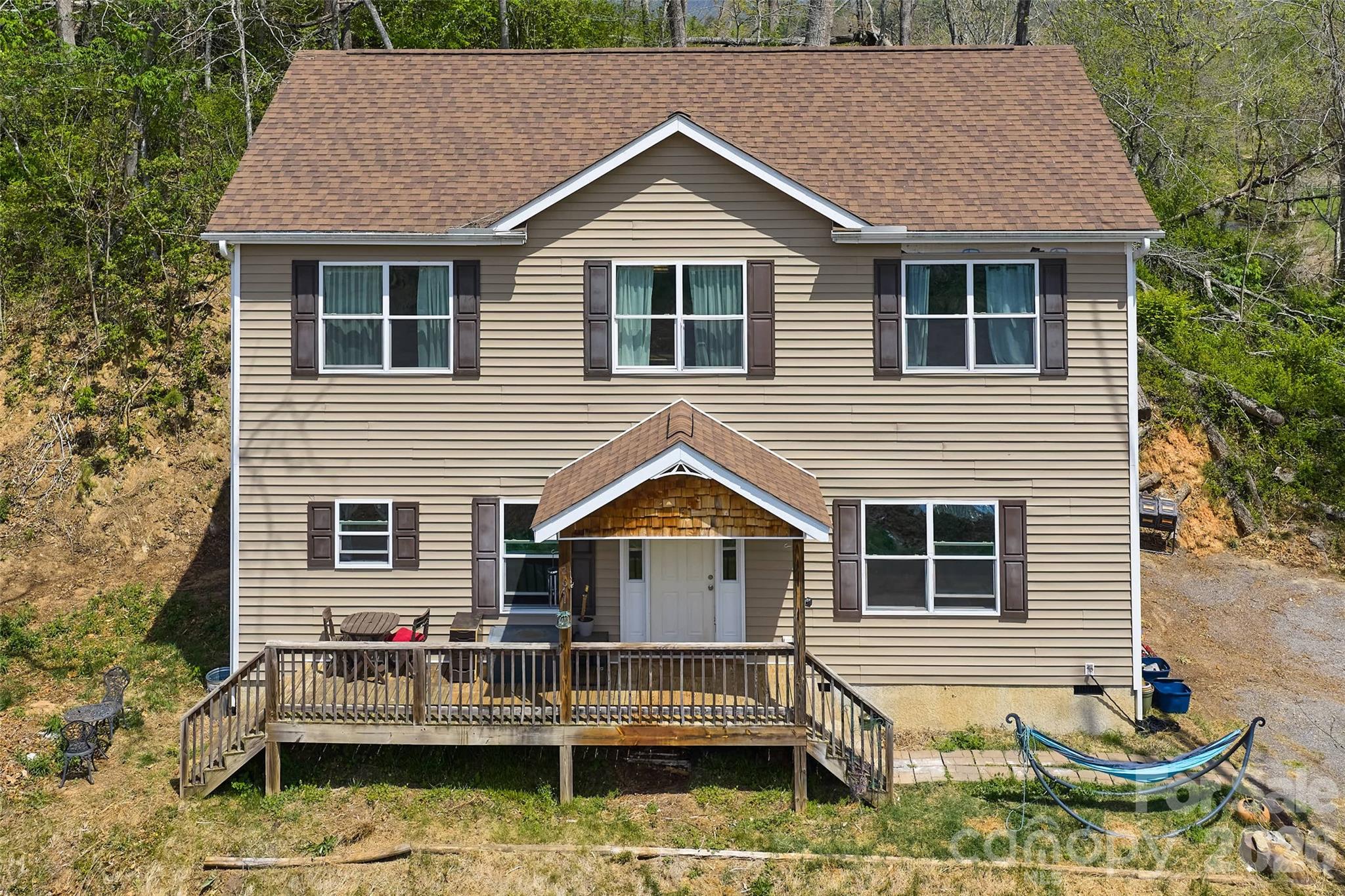 26 Brigman Road Weaverville, NC 28787 - Photo 2 of 27 a view of house with yard and outdoor seating