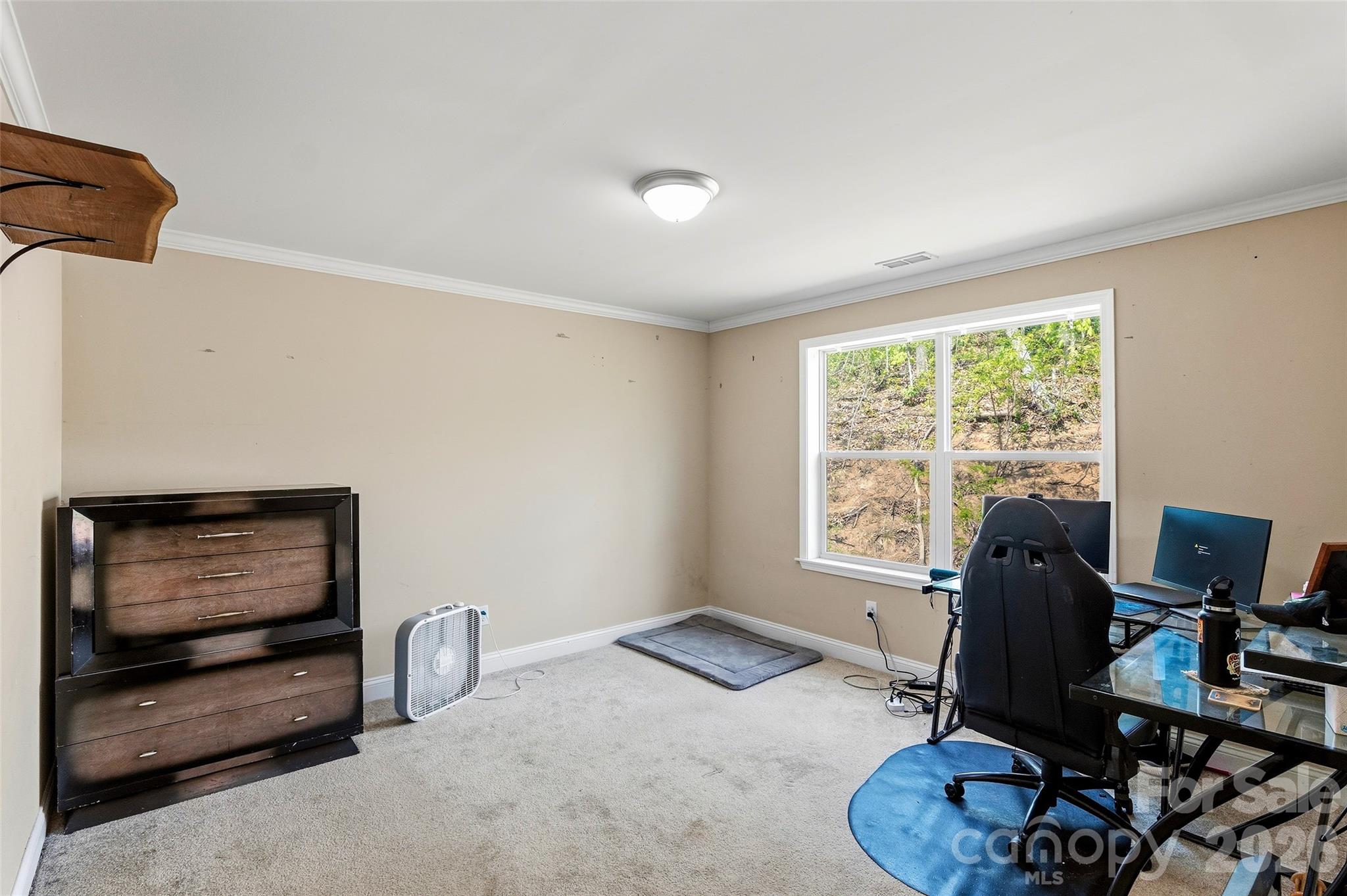 26 Brigman Road Weaverville, NC 28787 - Photo 23 of 27 a workspace with furniture and a window