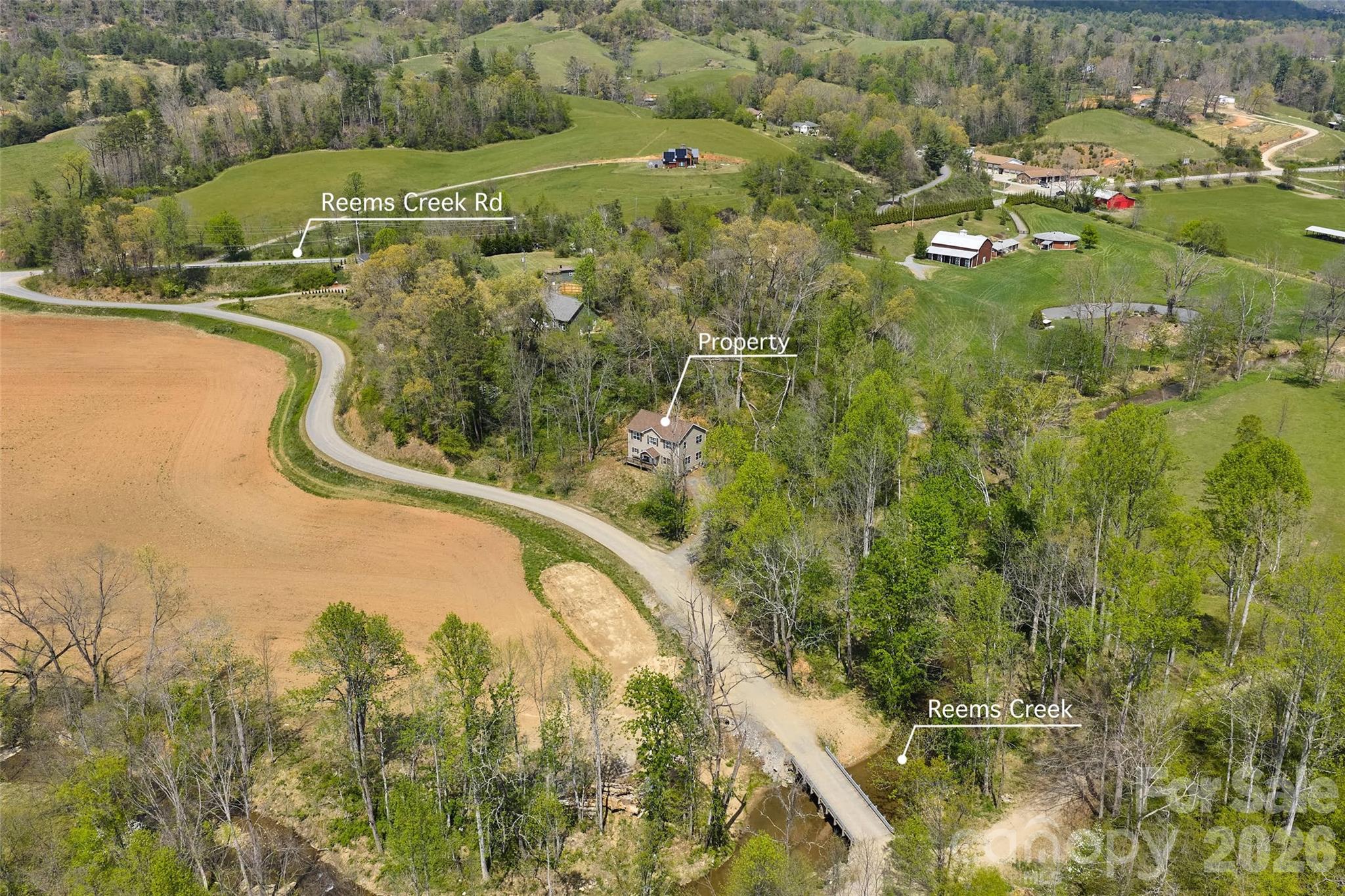 26 Brigman Road Weaverville, NC 28787 - Photo 26 of 27 a view of a swimming pool and outdoor space
