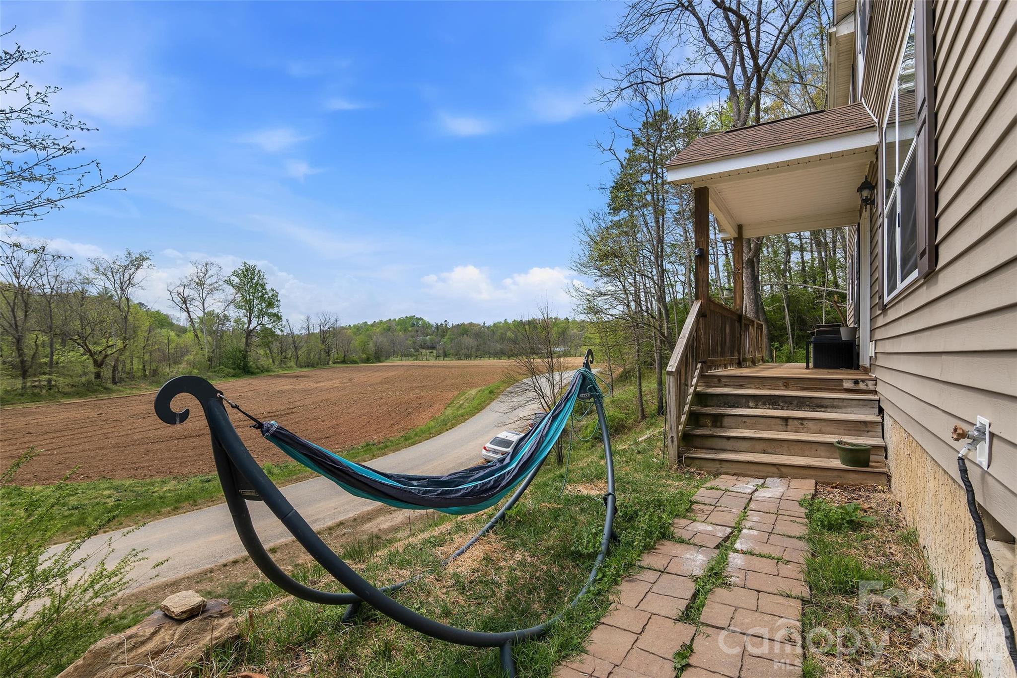 26 Brigman Road Weaverville, NC 28787 - Photo 4 of 27 a view of a swimming pool with lounge chair