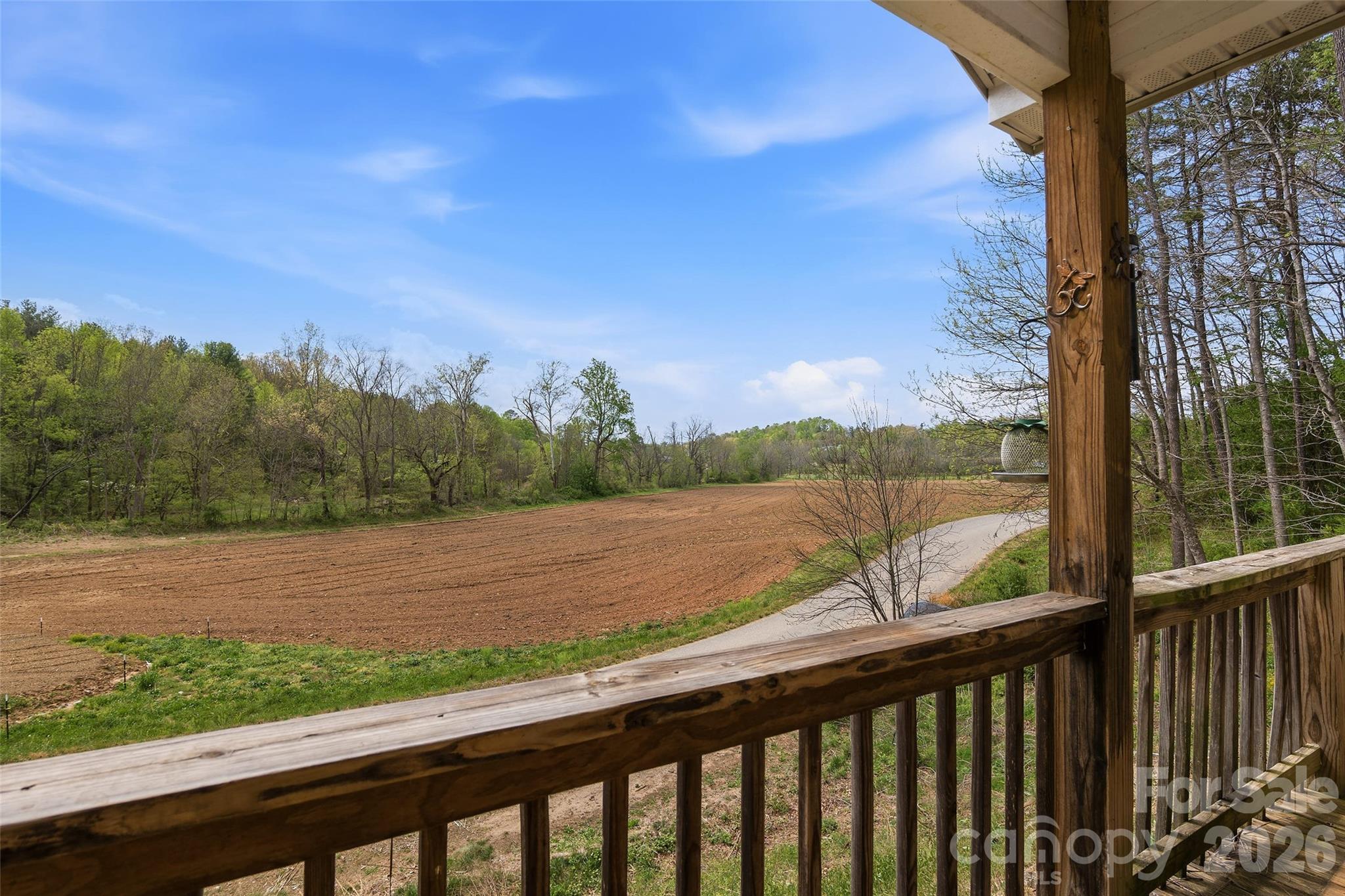 26 Brigman Road Weaverville, NC 28787 - Photo 5 of 27 a view of lake and mountain from a window